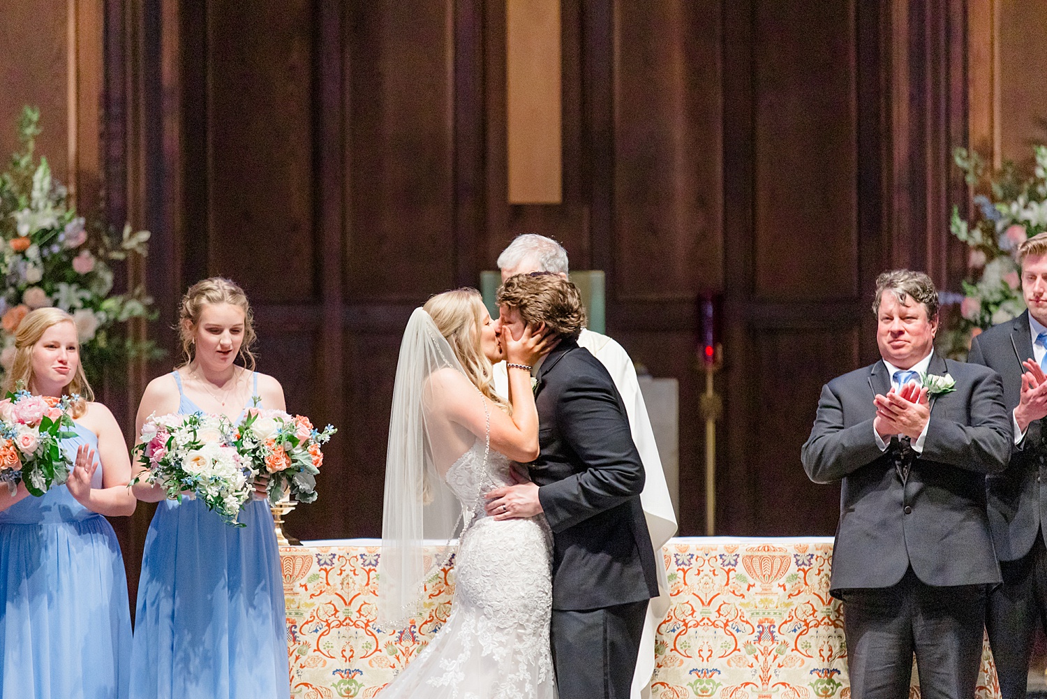 newlyweds kiss at wedding 