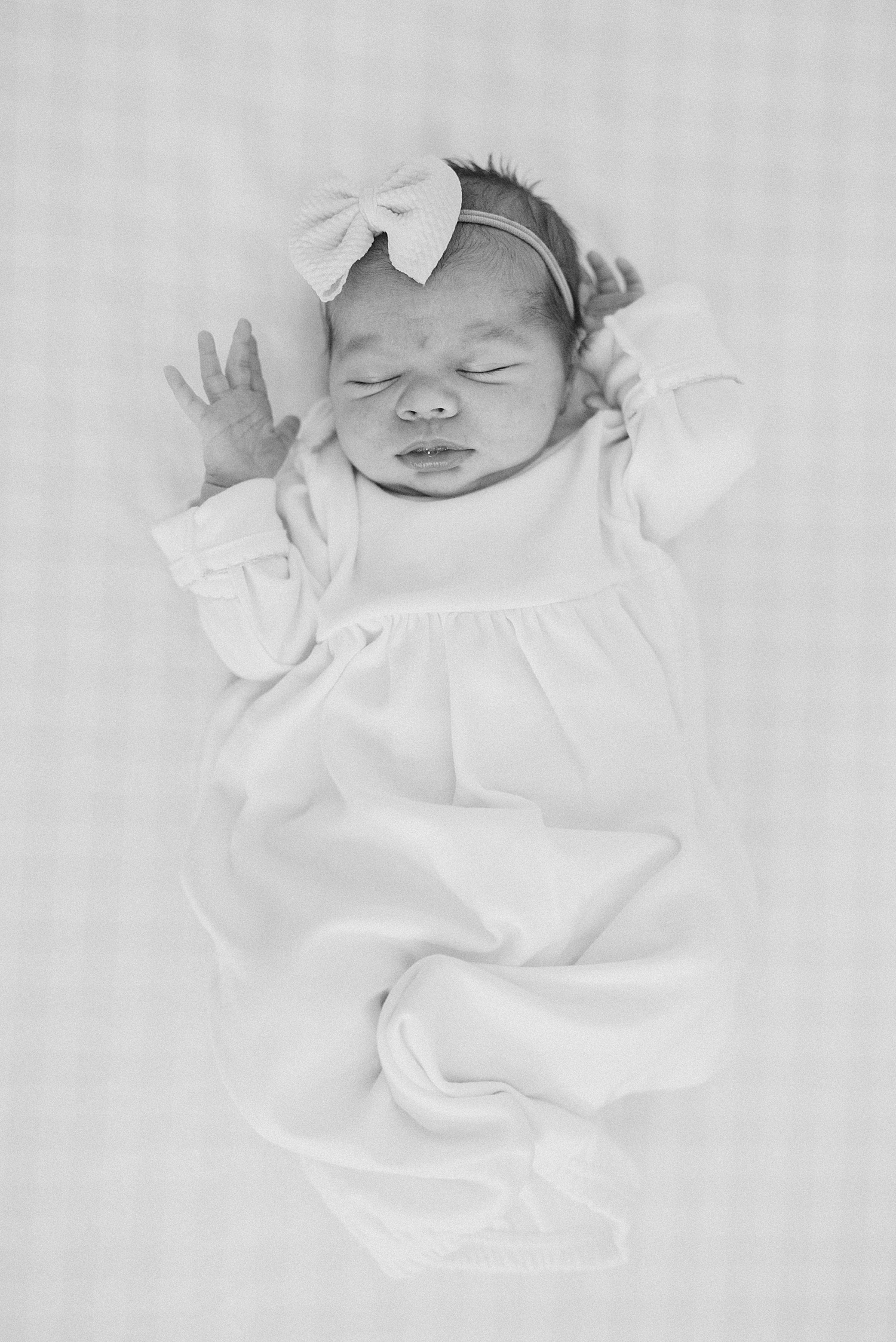 newborn girl sleeps soundly during Birmingham In-home Newborn