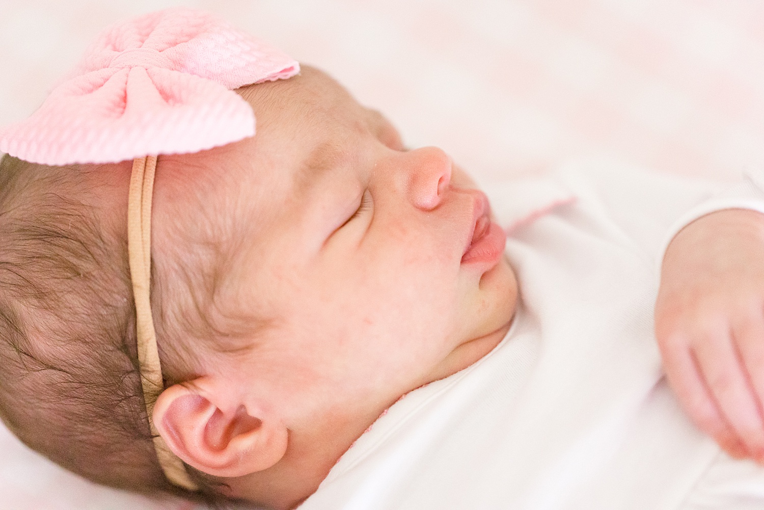 baby girl with pink headband