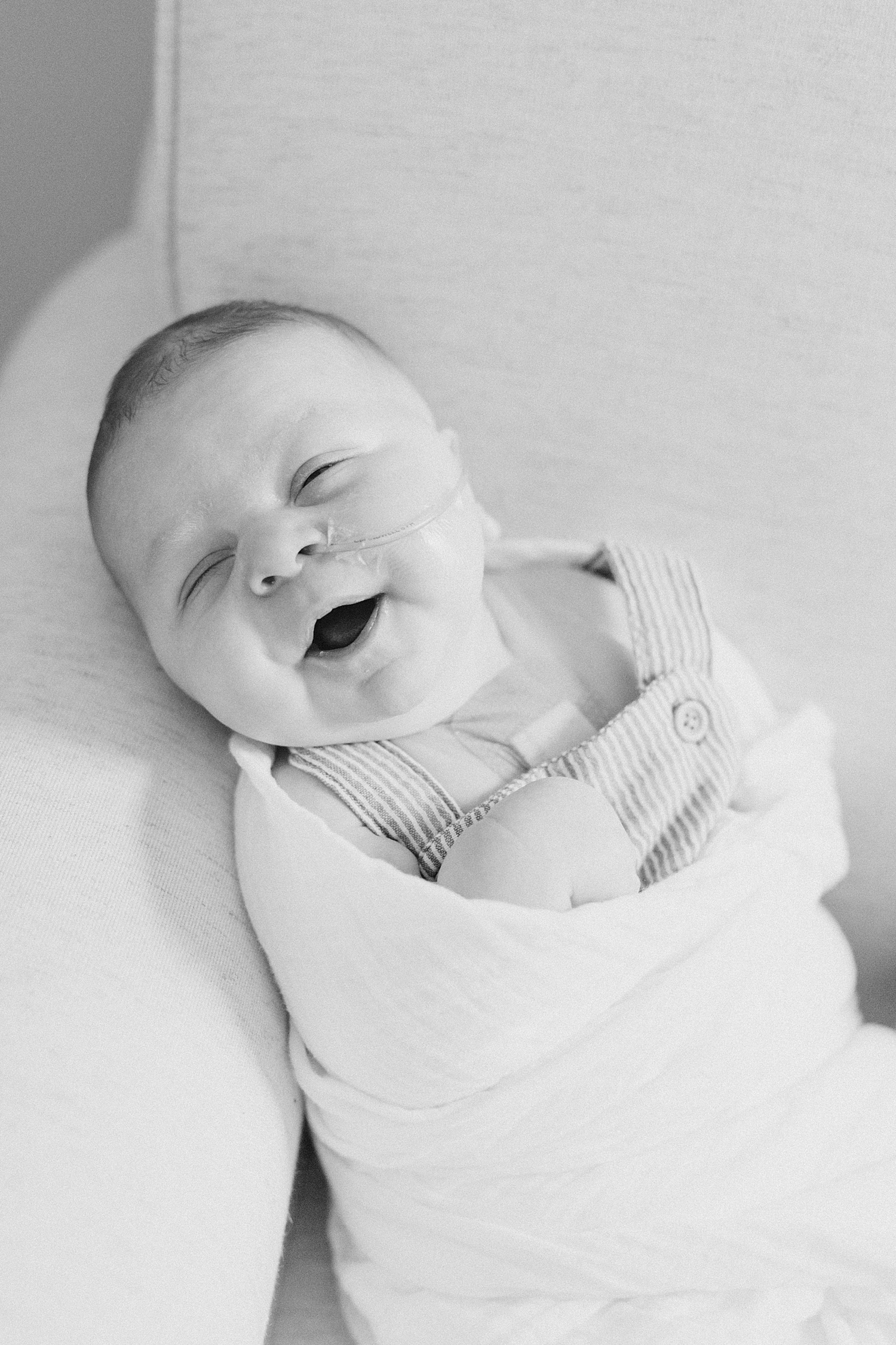 sleepy smiles from baby boy 