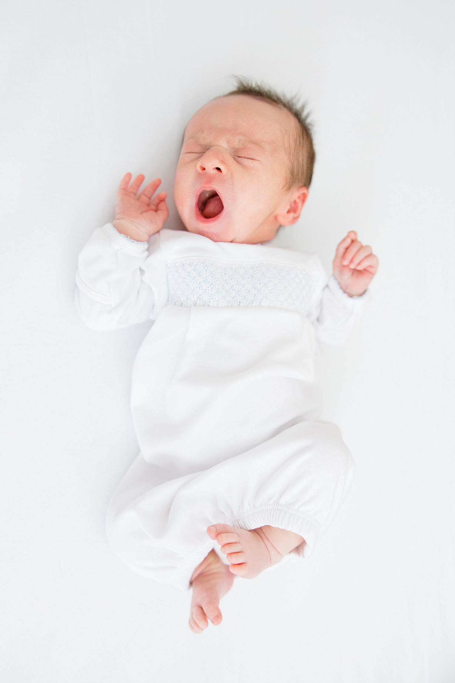 baby boy yawns 