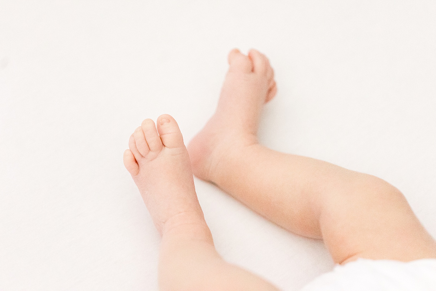tiny toes of newborn boy