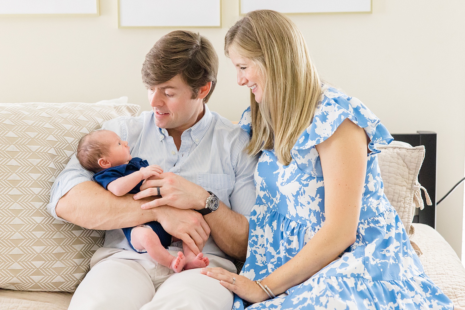 parents hold their second born son during Cozy In-Home Newborn Session
