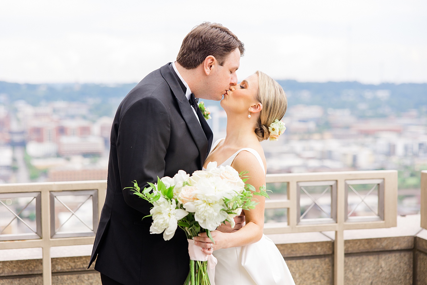 couple kiss on 31st floor at City Club Birmingham