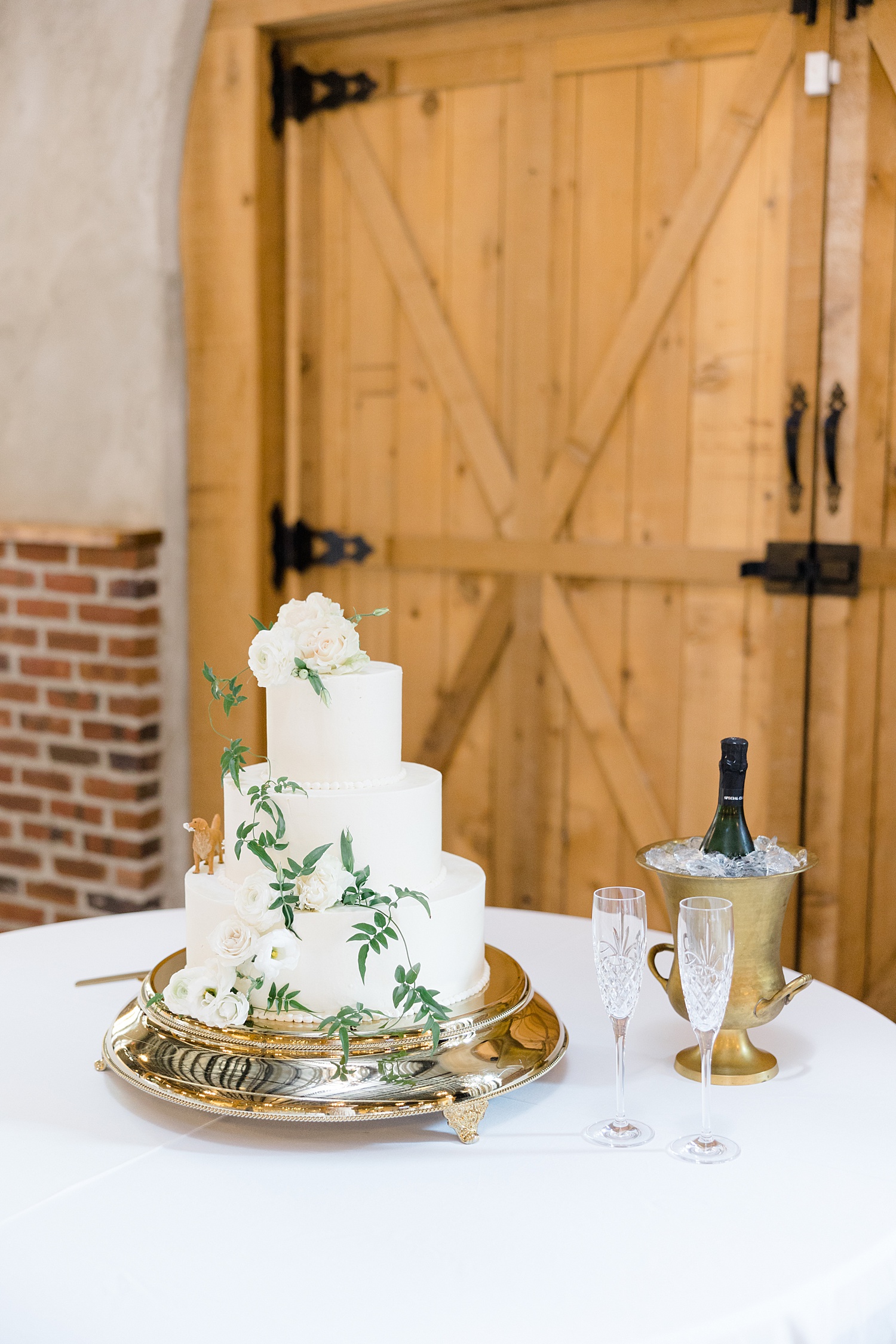 three tiered white wedding cake