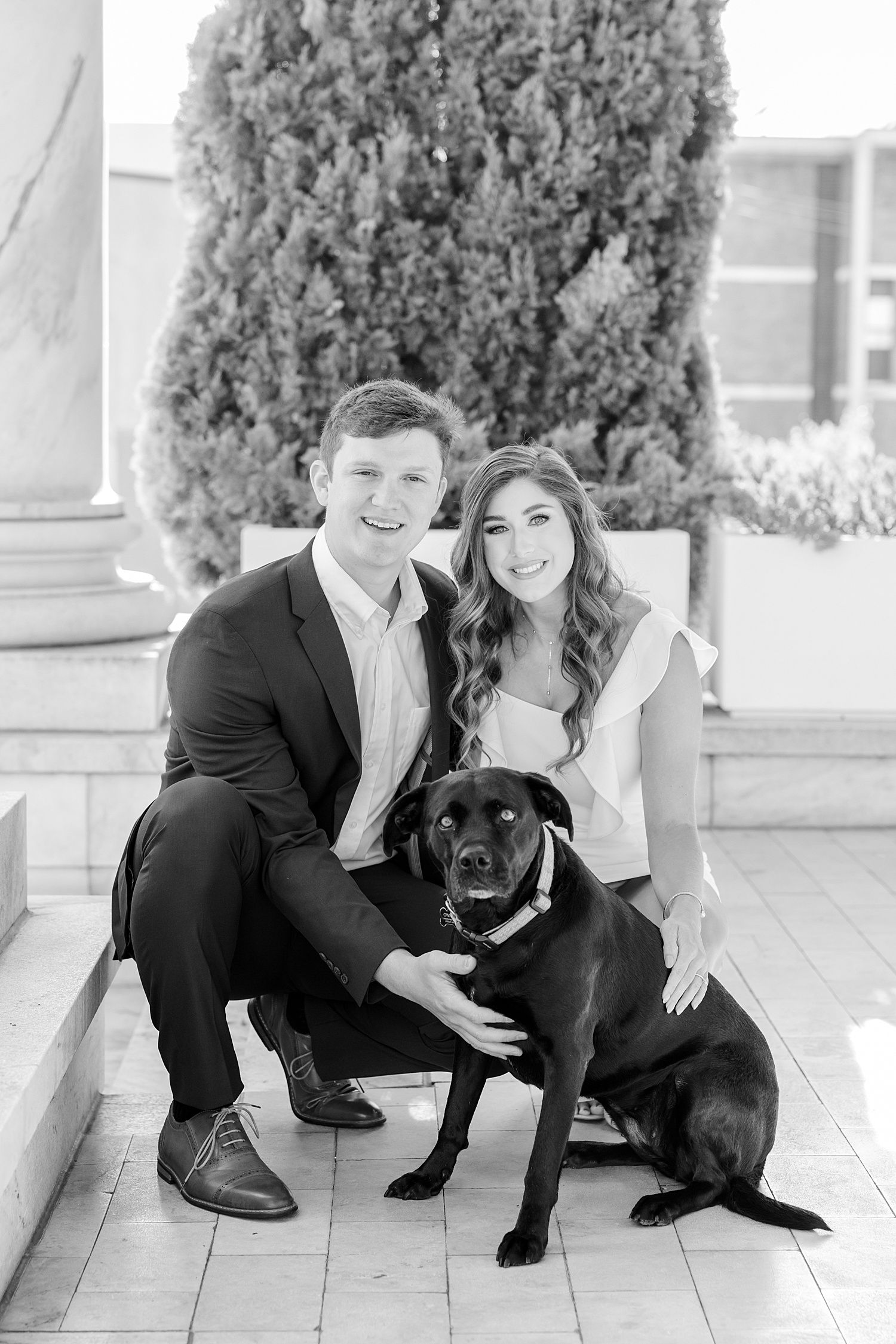 Couple with their dog during engagement photos 