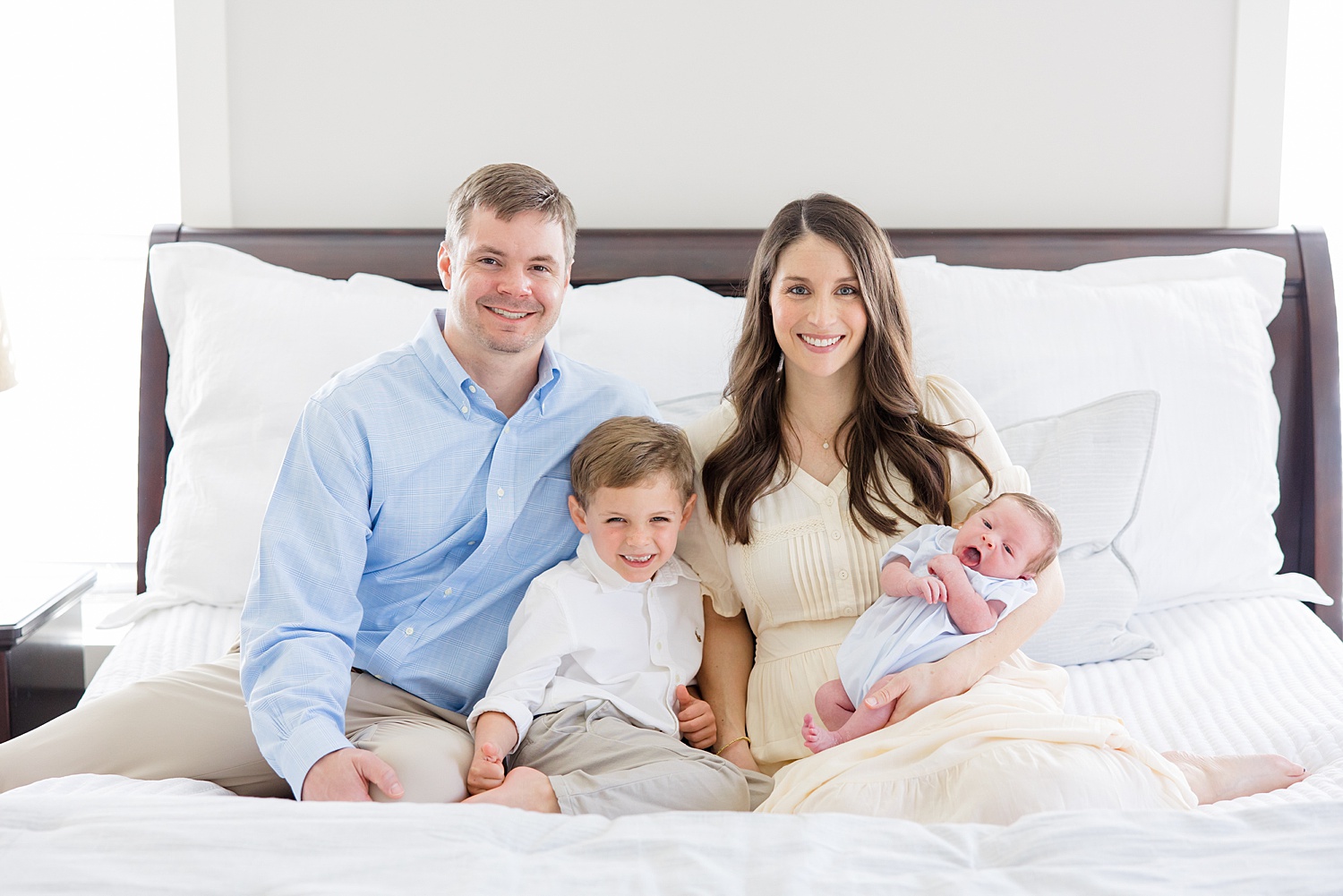 new family of four during Birmingham in-home newborn session 
