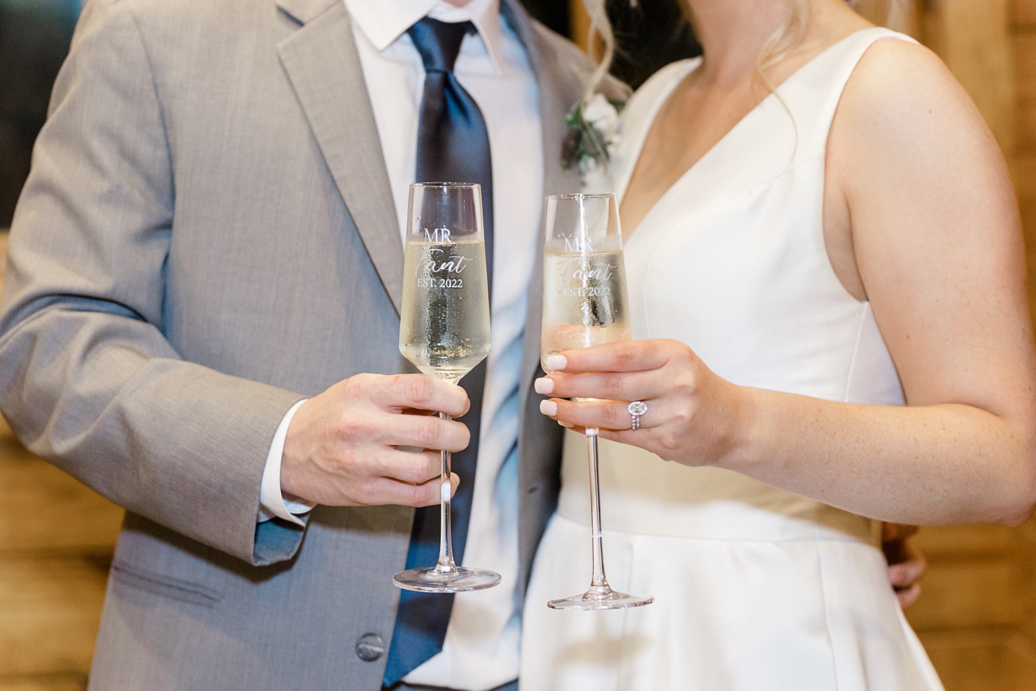 couple holding champagne glasses