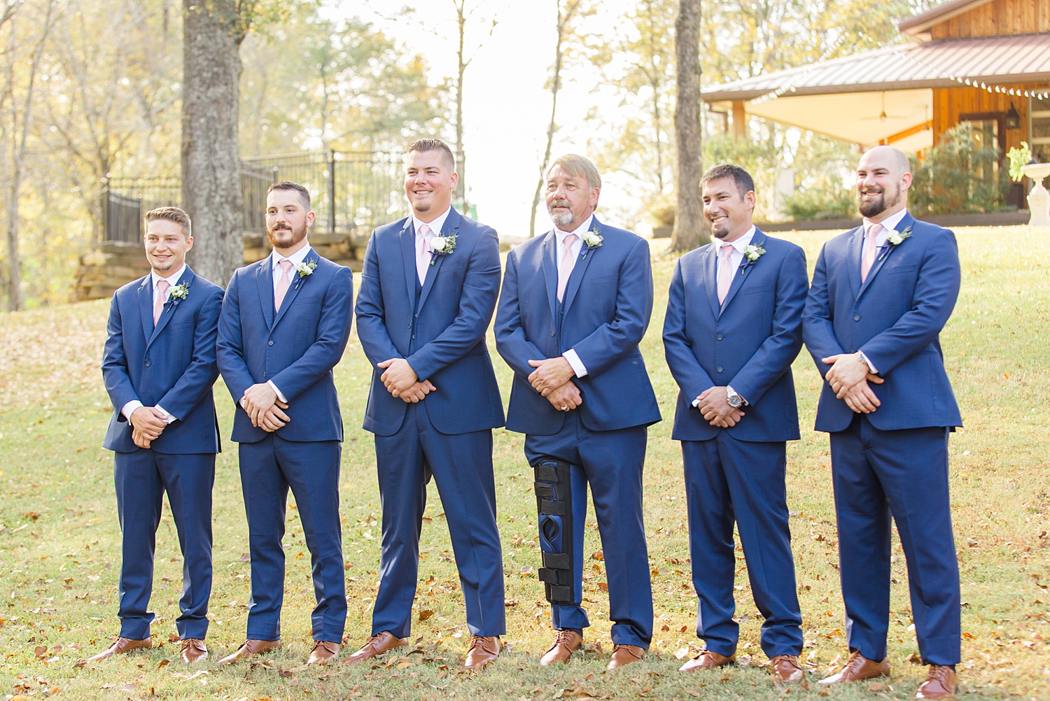 groom and groomsmen in navy suits from Mathews Manor Wedding