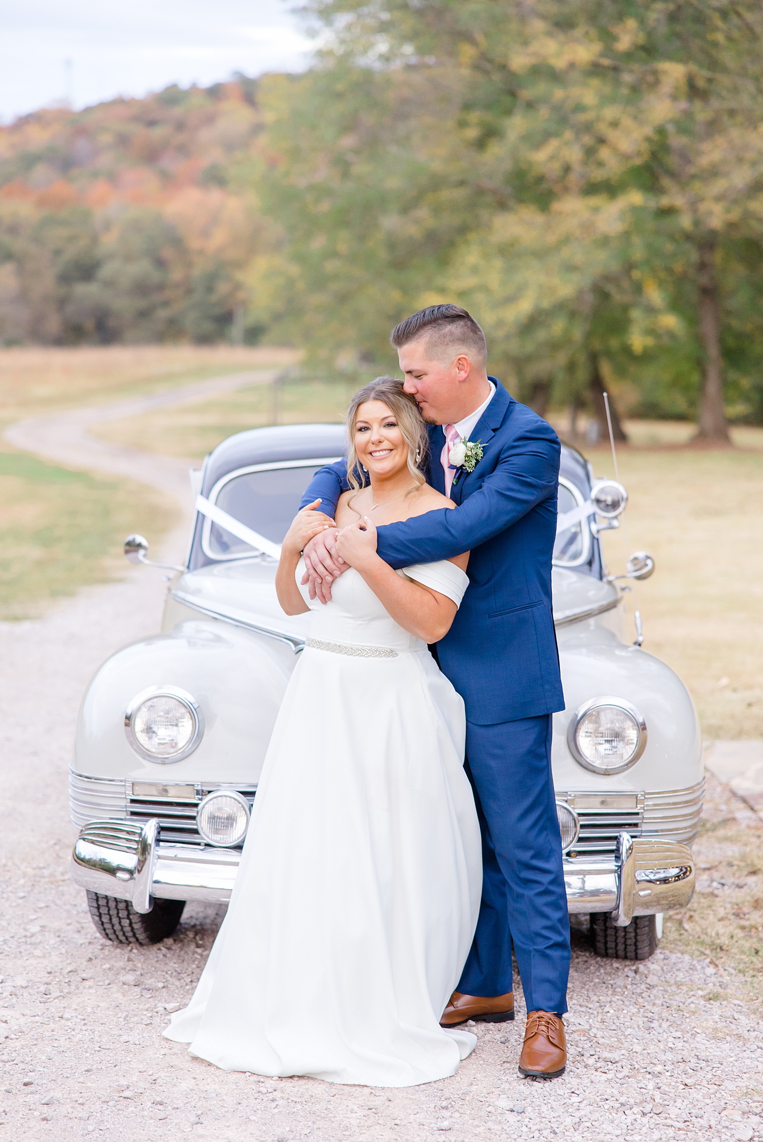 couple in front of classic car after Mathews Manor Wedding