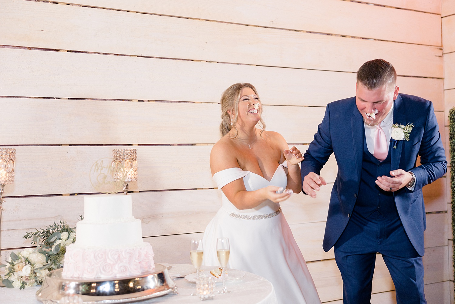 bride smashes cake in groom's face