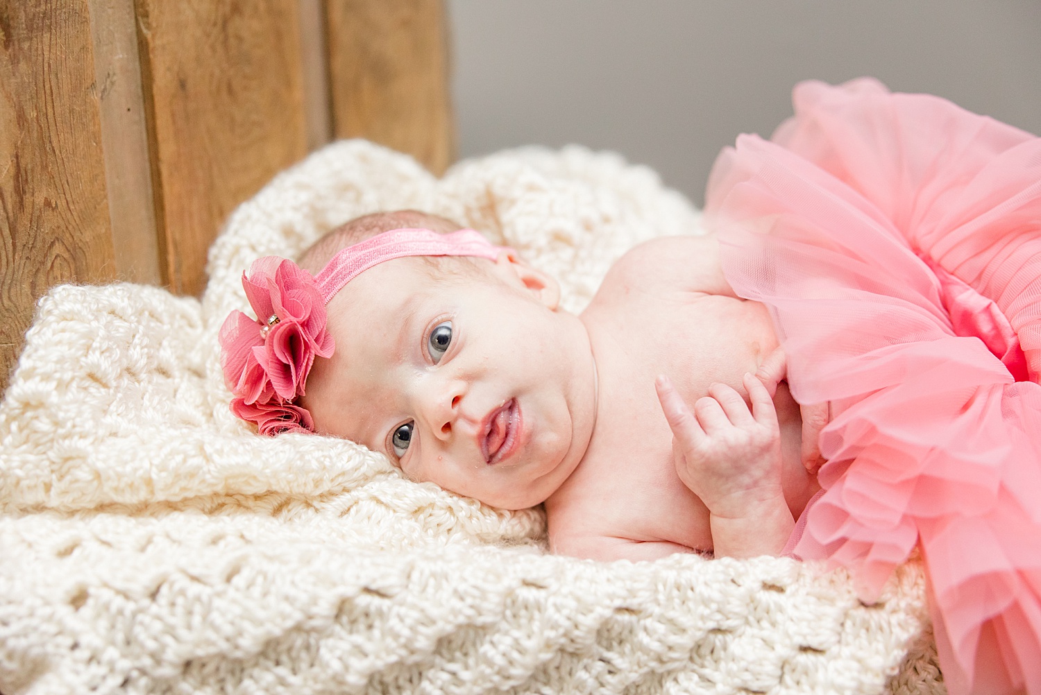 little girl in pink tutu and headband