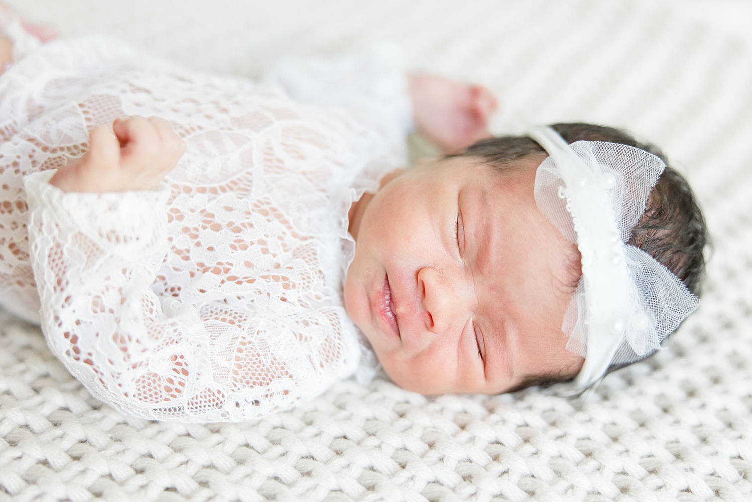 newborn sleeps during portrait session