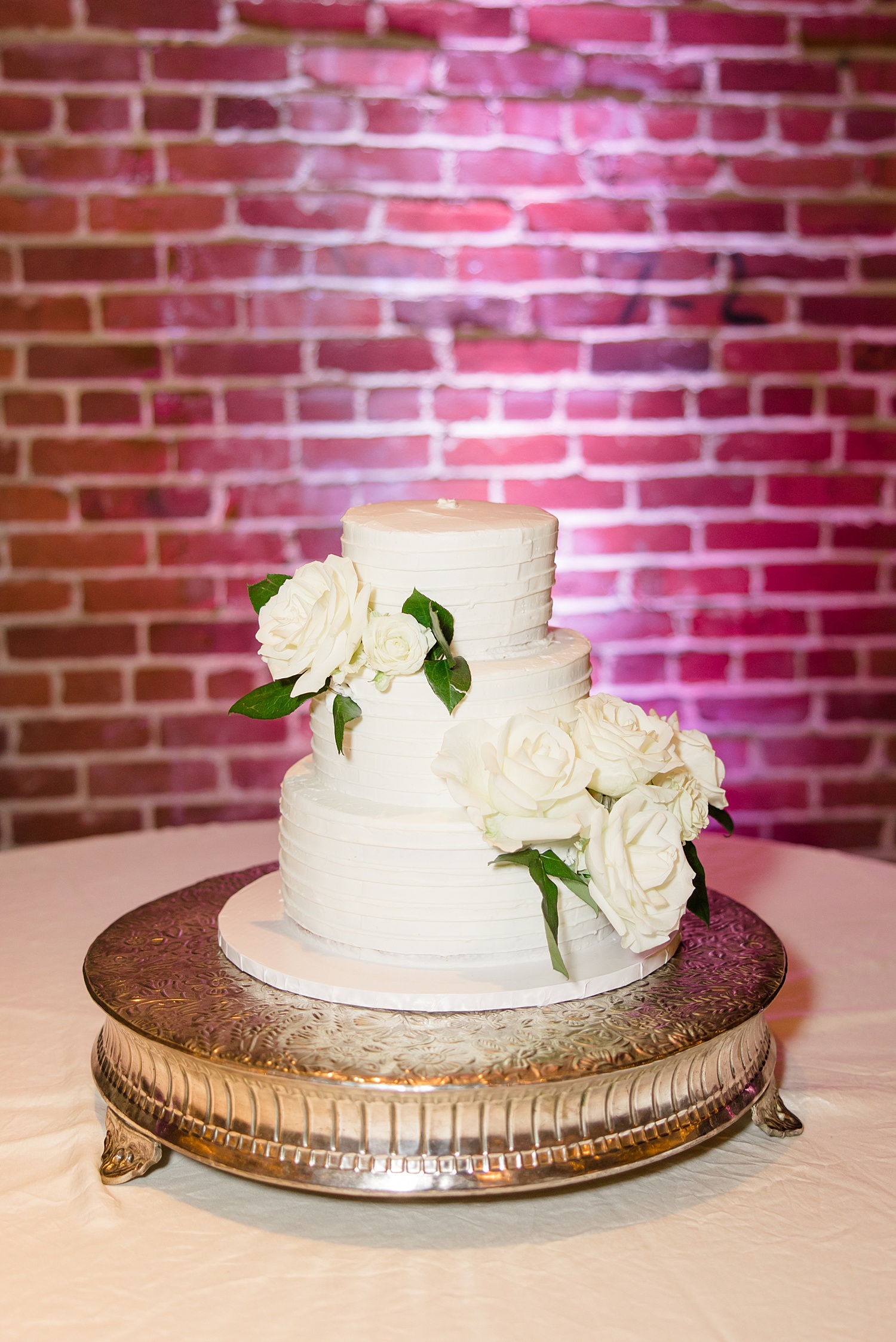 Classic white cake with white flowers from Birmingham Wedding at B&A Warehouse 