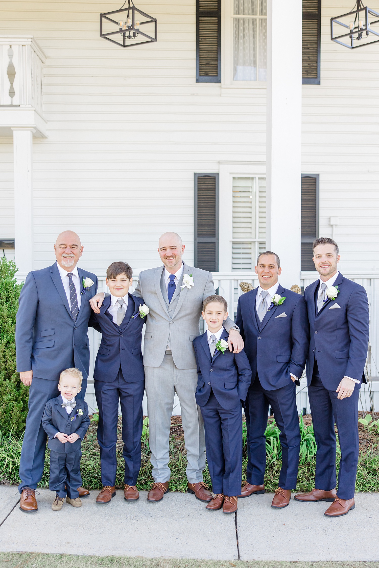 groom with groomsmen and sons