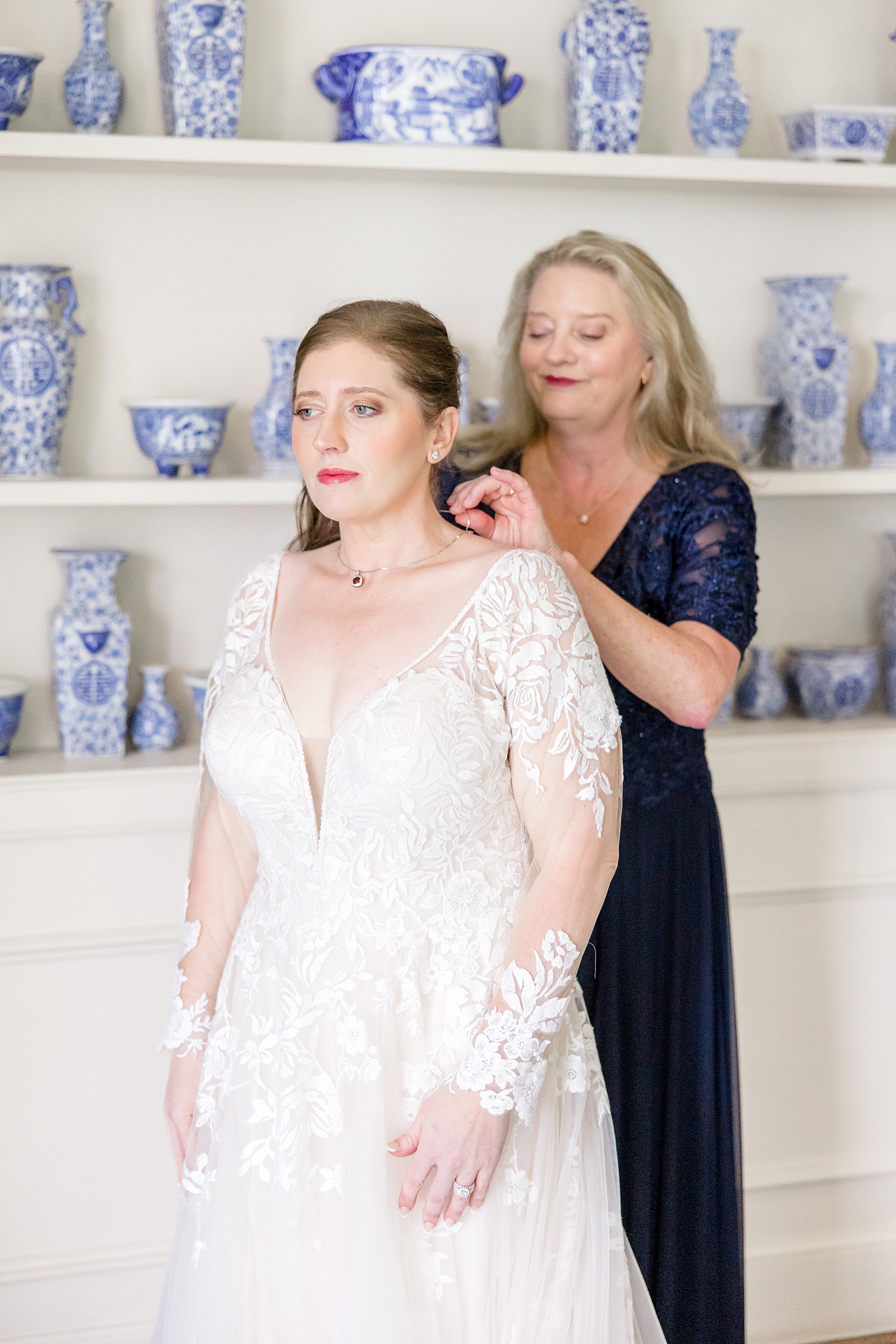 bride getting ready with her mom
