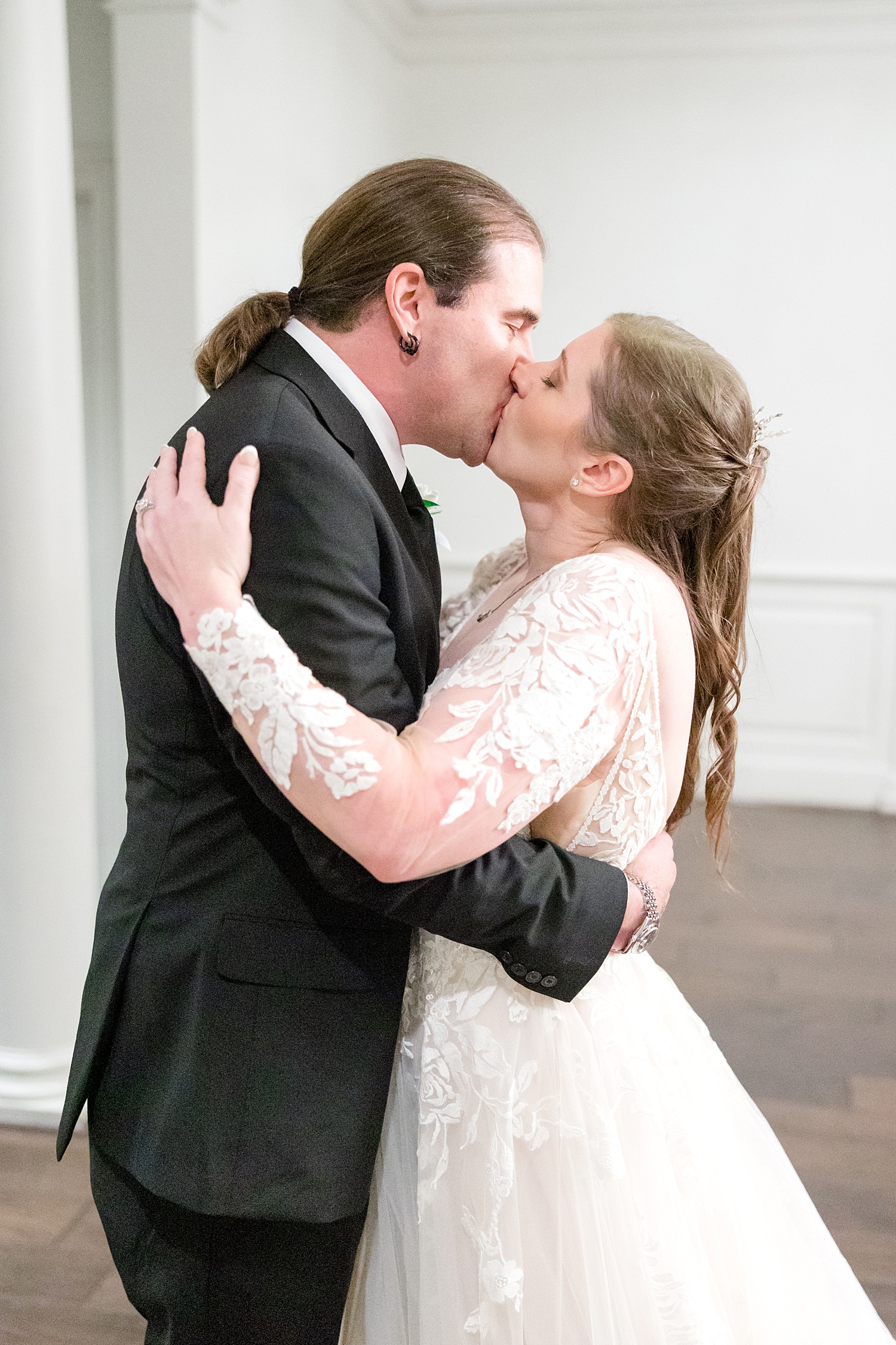 newlyweds kiss after wedding 