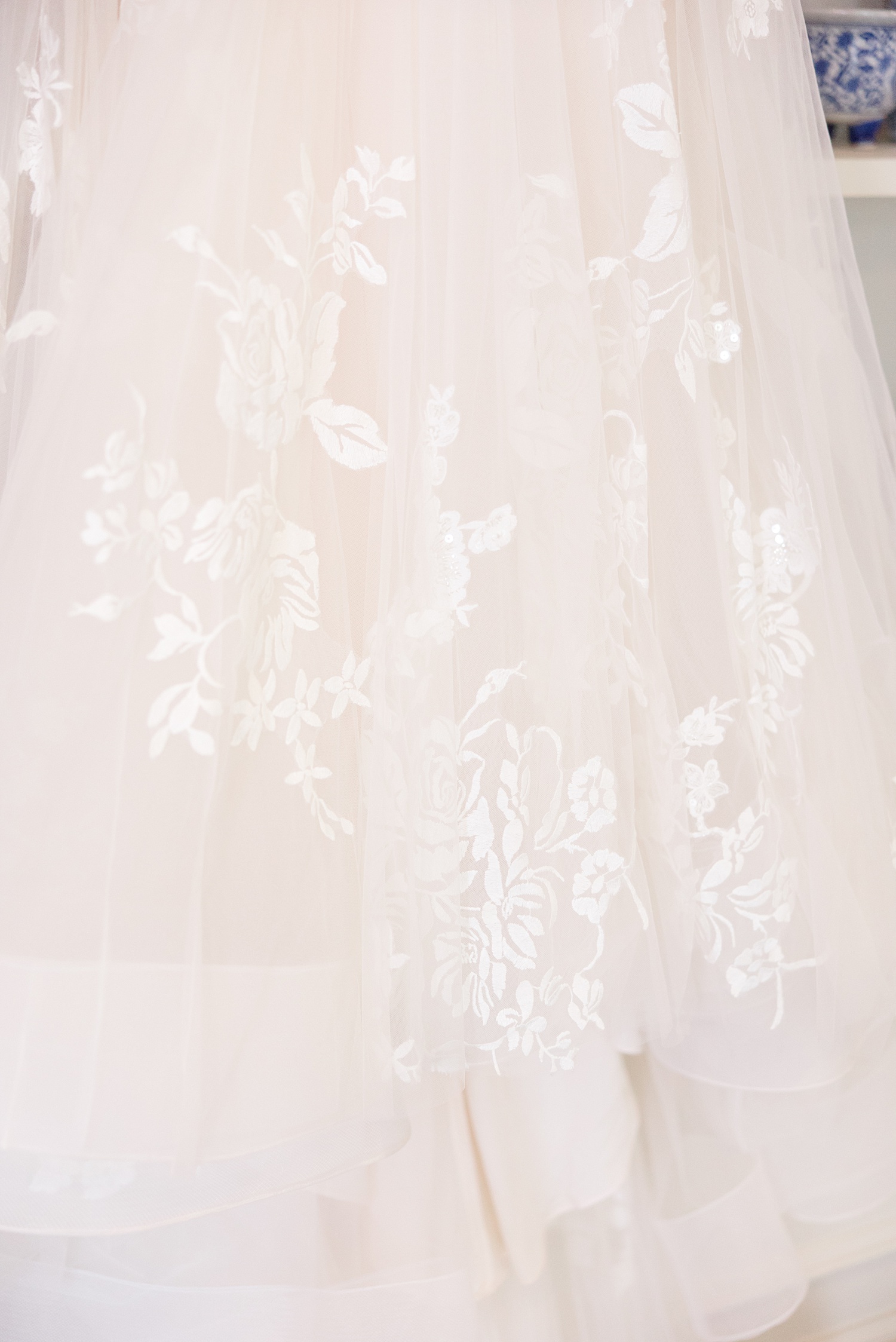 intricate floral lace detail from bride's wedding dress