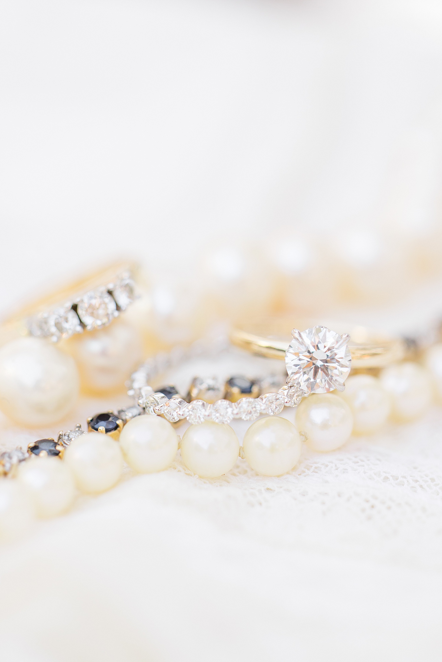 bride pearls and wedding rings