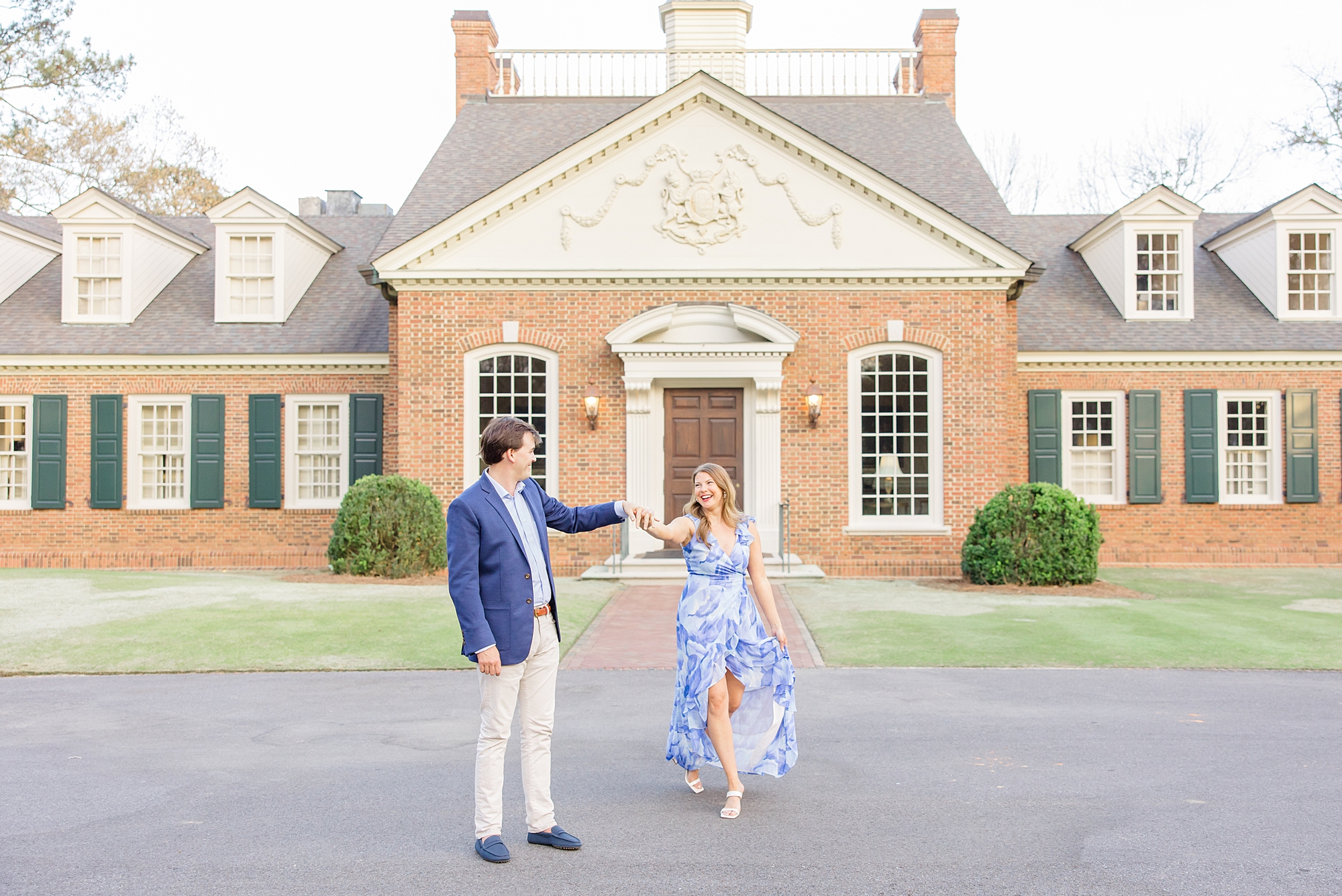 couple dance in front of club house at Shoal Creek Golf and Country Club